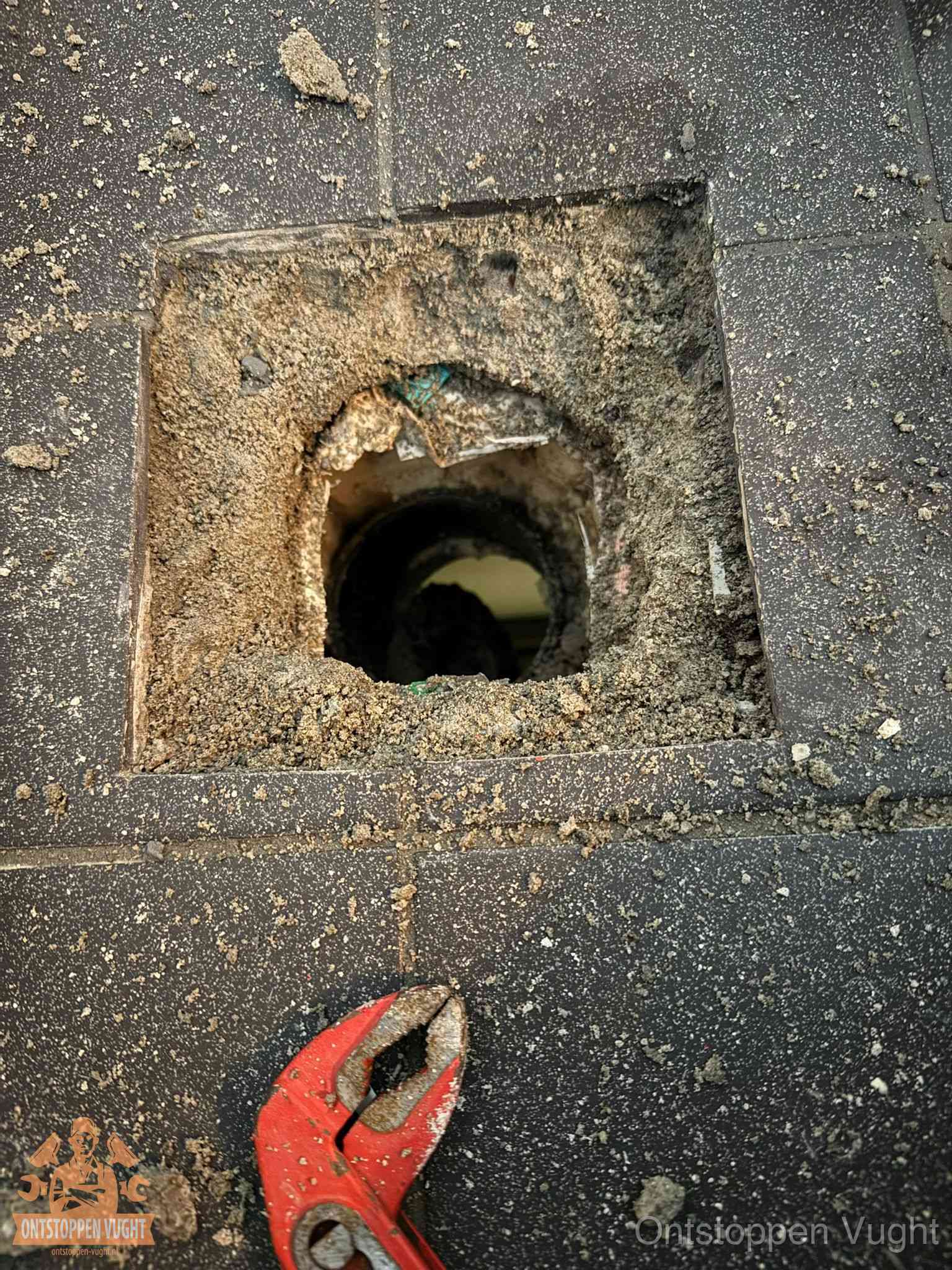 Rioolputje erfgrens eigendom in Vught